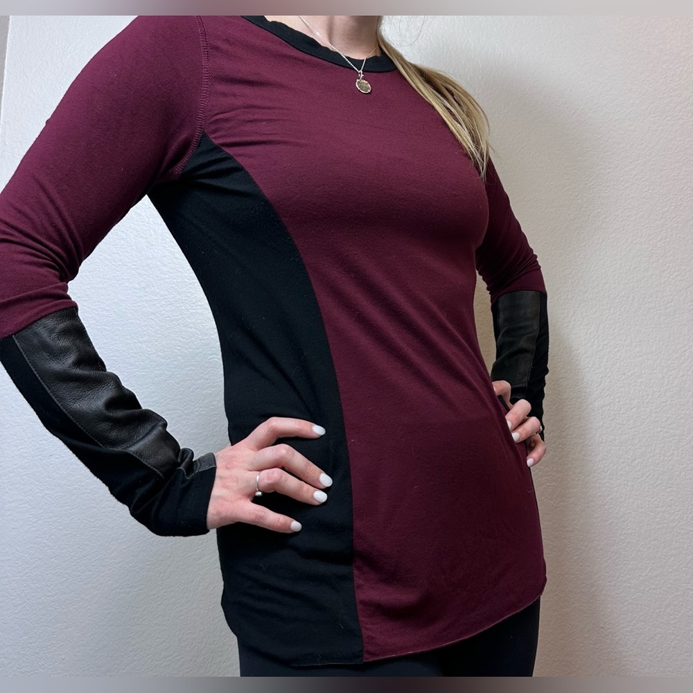 Fifteen twenty burgundy, long sleeve top with leather like accents on sleeves